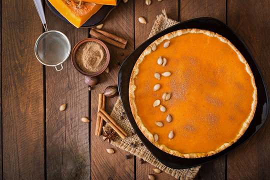 American pumpkin pie with cinnamon and nutmeg. Top view