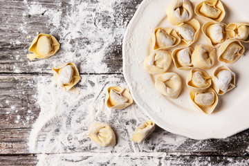 Pasta ravioli on flour