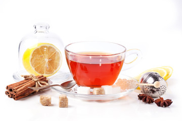 Cup of tea with lemon over white