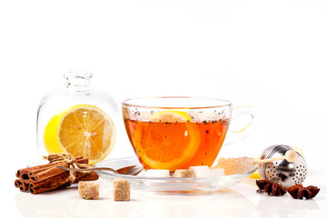 Cup of tea with lemon over white