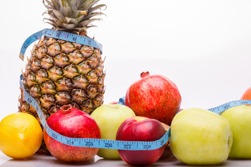 Tropical fruits with tape-line