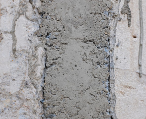 Bare raw concrete wall texture useful as background
