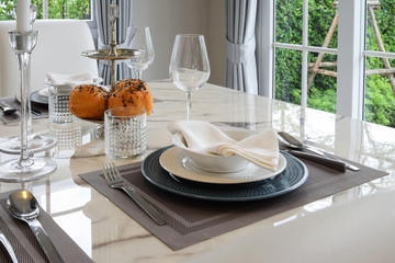 elegant table set in vintage style dining room interior