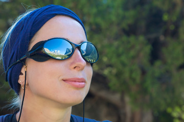 Cute Female Hiker Portrait of Smiling Girl Sporty Head Bandana Sunglasses Reflection of Mountain Landscape