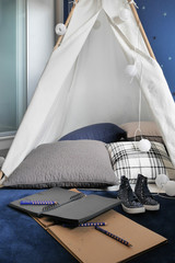 Fototapeta na wymiar Tent style homework area in the living room