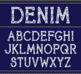 Vector serif font  handcrafted texture. White print on blue background