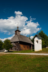 Fototapeta na wymiar Wooden church from Slovenske rudno, Turiec - Museum of the Slovak Village, Martin, Slovakia
