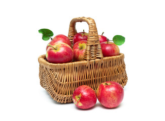 Fototapeta na wymiar basket with ripe red apples isolated on white background