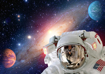 Astronaut spaceman helmet outer space solar system planet universe. Elements of this image...