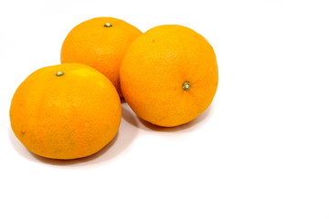 Orange fruit on white background