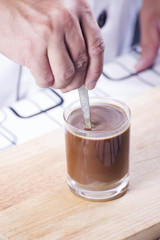 a coffee cup and stir