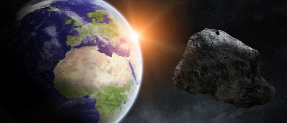 Obraz na płótnie Canvas Asteroids threat over planet earth