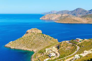 Fototapeta na wymiar Peacful view on cozy green peninsula, Greece