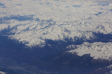 Fototapeta premium view from the the plane to the mountains