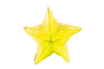 Close-up of a whole ripe carambola (starfruit), viewed from the front, isolated on white background.