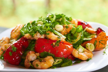 hot appetizer with vegetables and prawns
