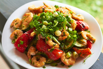 hot appetizer with vegetables and prawns
