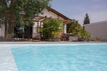 Private swimming pool at summertime