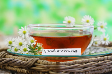 Good morning card with chamomile tea with copy space
