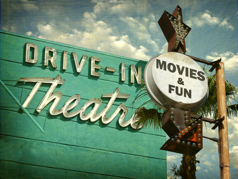 Aged And Worn Vintage Photo Of Drive In Movies Sign