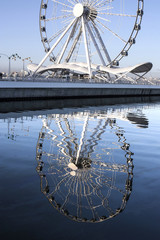 Attraction Ferris wheel in the seaside park