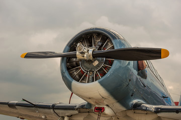 propeller aircraft on the background of a stormy sky