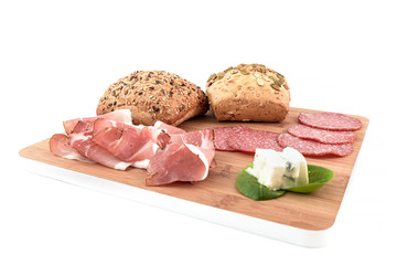 cereal bread, speck, salami and gorgonzola