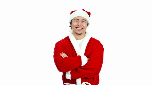 Young and attractive santa claus wearing a red santa suit and hat feeling great and happy. White background.