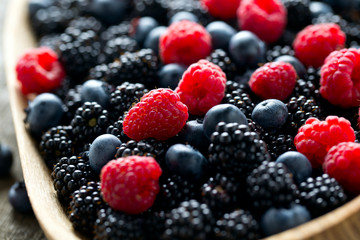 forest berres in a wooden bowl