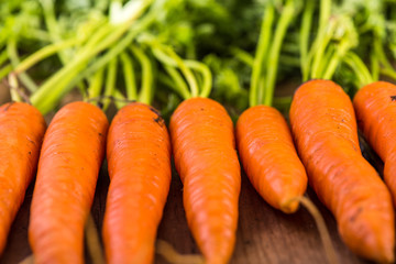 food background, farm fresh vibrant carrots