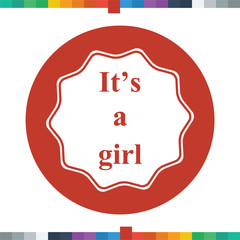 Badge with the words it's a girl.