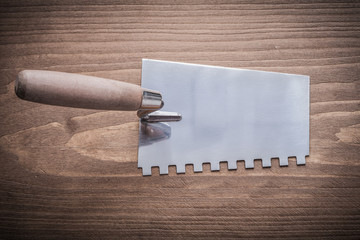 putty spattle with wooden handle