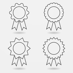 Icon set of award badges or medals with ribbons
