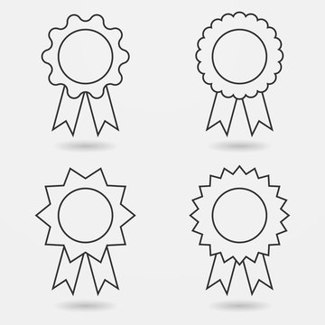 Icon set of award badges or medals with ribbons