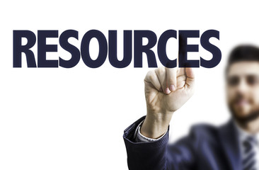 Business man pointing the text: Resources