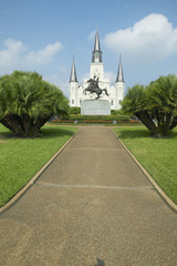 Fototapeta na wymiar Andrew Jackson Statue & St. Louis Cathedral, Jackson Square in New Orleans, Louisiana