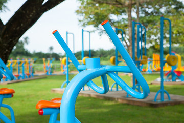 Exercise equipment in public park in the morning at Thailand