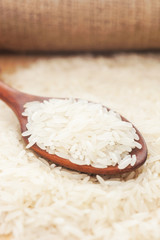 Rice, White rice in wooden spoon with hemp