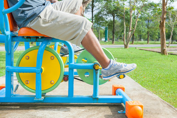 Exercise equipment in public park in the morning at Thailand