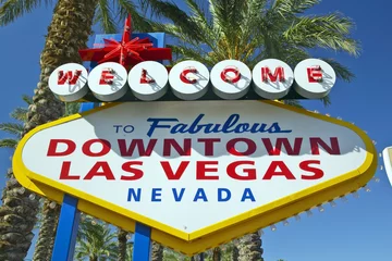 Fotobehang Colorful sign reads ÒWelcome to Fabulous Las Vegas, NevadaÓ in daytime with blue sky © spiritofamerica