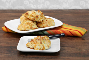 Cheddar cheese and garlic biscuit on a plate.