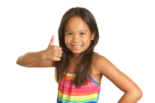 Cute Filipino Girl on White Background Smiling and giving the thumbs up