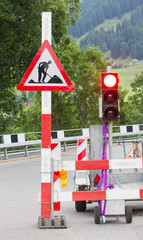 Road signs in a street under reconstruction