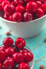 Sweet Cherry in Bowl on Rustic Table