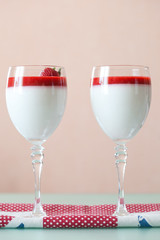 panna cotta dessert with strawberry sirup