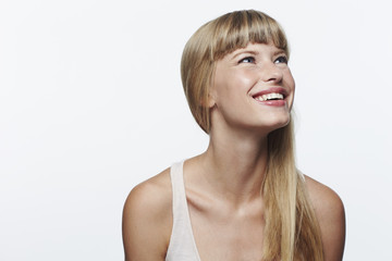Naklejka premium Beautiful and inspired young woman in studio