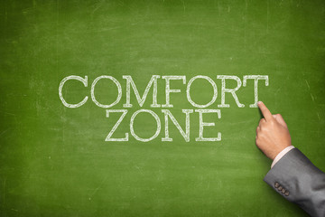 Obraz premium Comfort zone text on blackboard