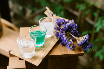 Onsen series : wooden bathtub with sample of mineral water