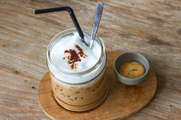 Ice cappuccino Coffee on wood  background