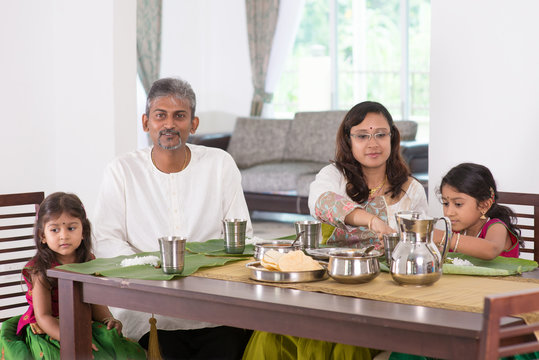 Indian Family Dining At Home